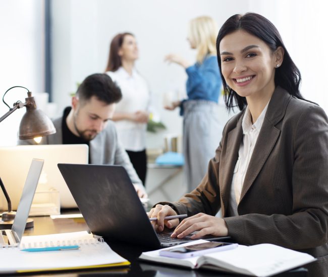 medium-shot-woman-working-laptop